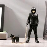 Iconic Banksy a trendy man playing with dogs, white fashion toys, art sculptures and ornaments - Image 3