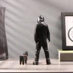 Iconic Banksy a trendy man playing with dogs, white fashion toys, art sculptures and ornaments - Image 2