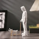 Iconic Banksy a trendy man playing with dogs, white fashion toys, art sculptures and ornaments - Image 4